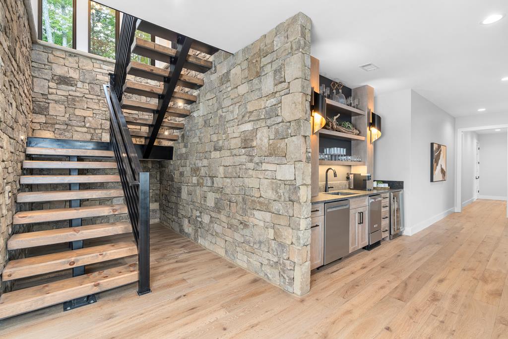 417 Bill Claypool Drive Blue Ridge, GA 30513 - Photo 35 of 73 a kitchen with cabinets and wooden floor