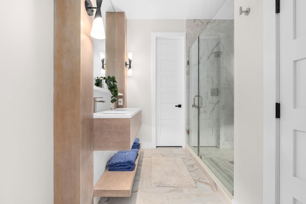 417 Bill Claypool Drive Blue Ridge, GA 30513 - Photo 44 of 73 a bathroom with a sink and a mirror