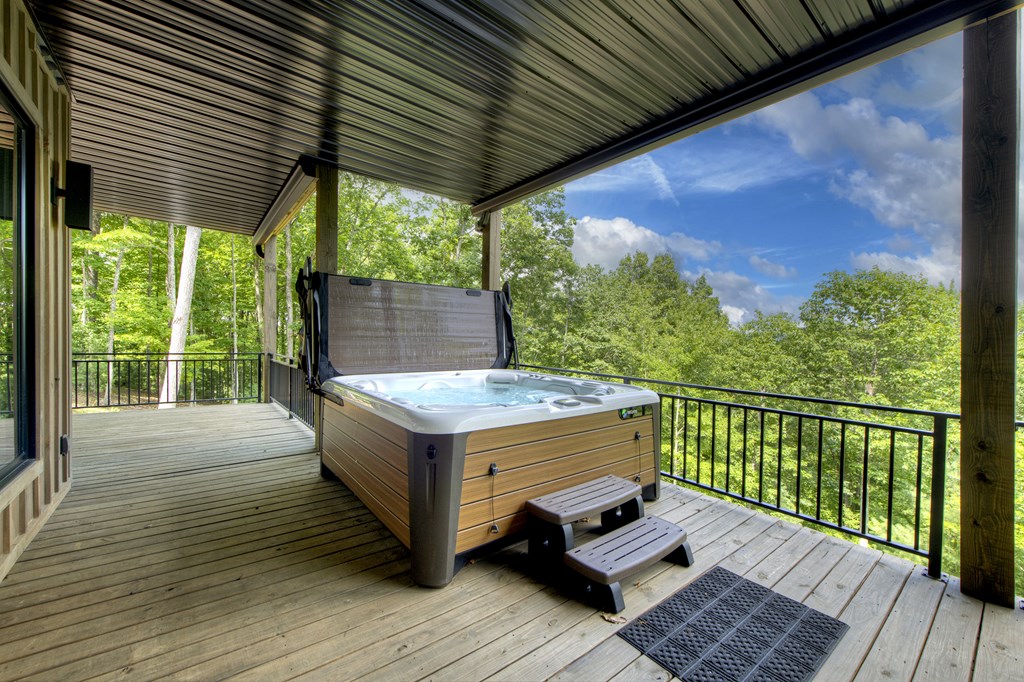 417 Bill Claypool Drive Blue Ridge, GA 30513 - Photo 53 of 73 a view of a balcony with furniture