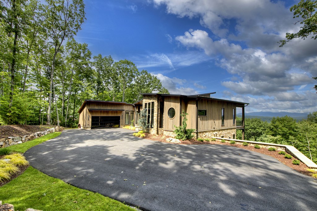 417 Bill Claypool Drive Blue Ridge, GA 30513 - Photo 62 of 73 a front view of a house with a yard