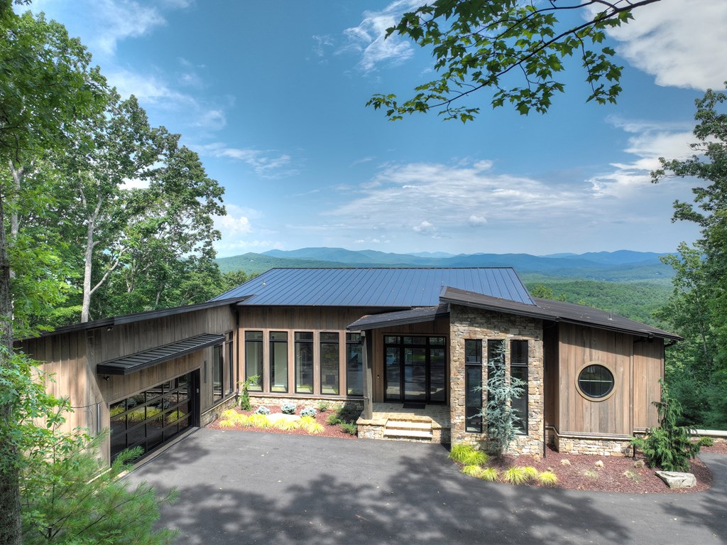 417 Bill Claypool Drive Blue Ridge, GA 30513 - Photo 65 of 73 a front view of a house with a yard