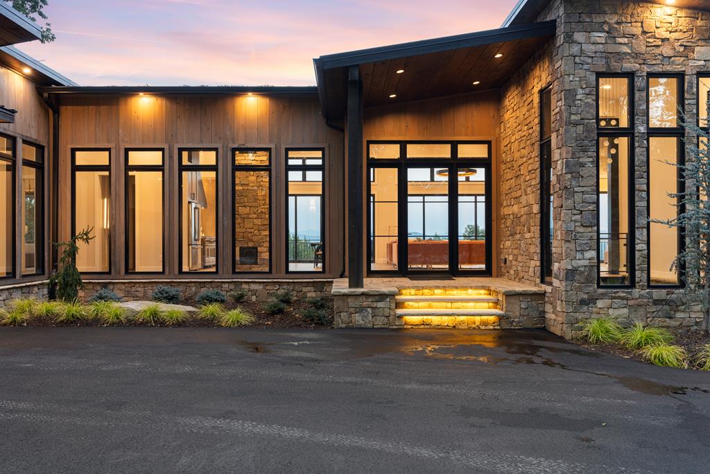 417 Bill Claypool Drive Blue Ridge, GA 30513 - Photo 68 of 73 a view of a brick building with a outdoor space