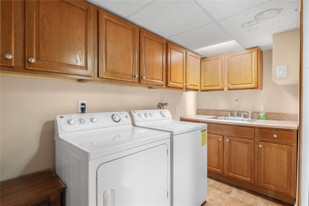 159 Hastings Street Brooklyn, NY 11235 - Photo 21 of 32 a utility room with dryer and washer