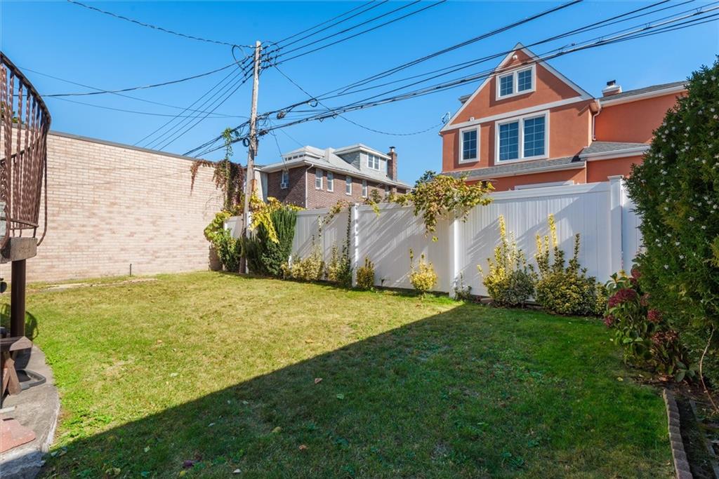 159 Hastings Street Brooklyn, NY 11235 - Photo 27 of 32 a front view of a house with a yard