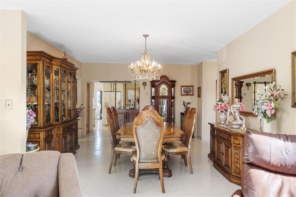 159 Hastings Street Brooklyn, NY 11235 - Photo 6 of 32 a view of a dining room with furniture and chandelier