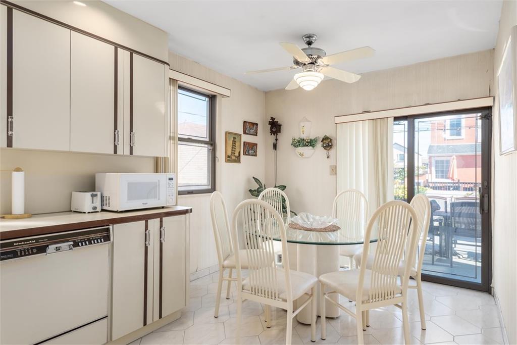 159 Hastings Street Brooklyn, NY 11235 - Photo 9 of 32 a view of a dining room with furniture and a chandelier