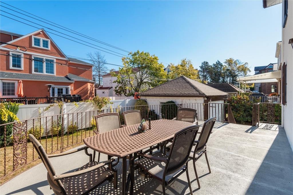 159 Hastings Street Brooklyn, NY 11235 - Photo 10 of 32 a view of a patio with a table and chairs