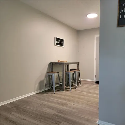 a view of dining room with wooden floor