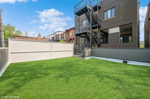 a backyard of a house with lots of green space