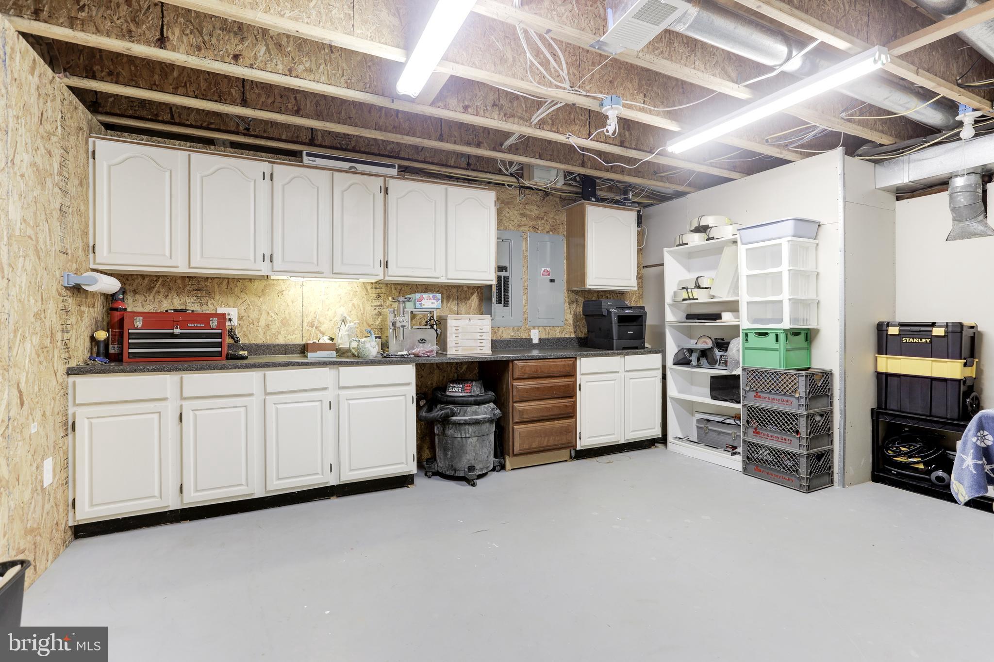 13304 Scotsmore Way Herndon, VA 20171 - Photo 49 of 56 Workroom w/ Cabinet Space