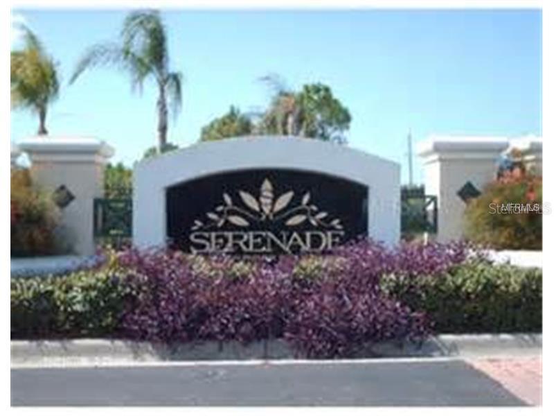 5174 Northridge Road, Unit 309 Sarasota, FL 34238 - Photo 1 of 1 a front view of a house with garden