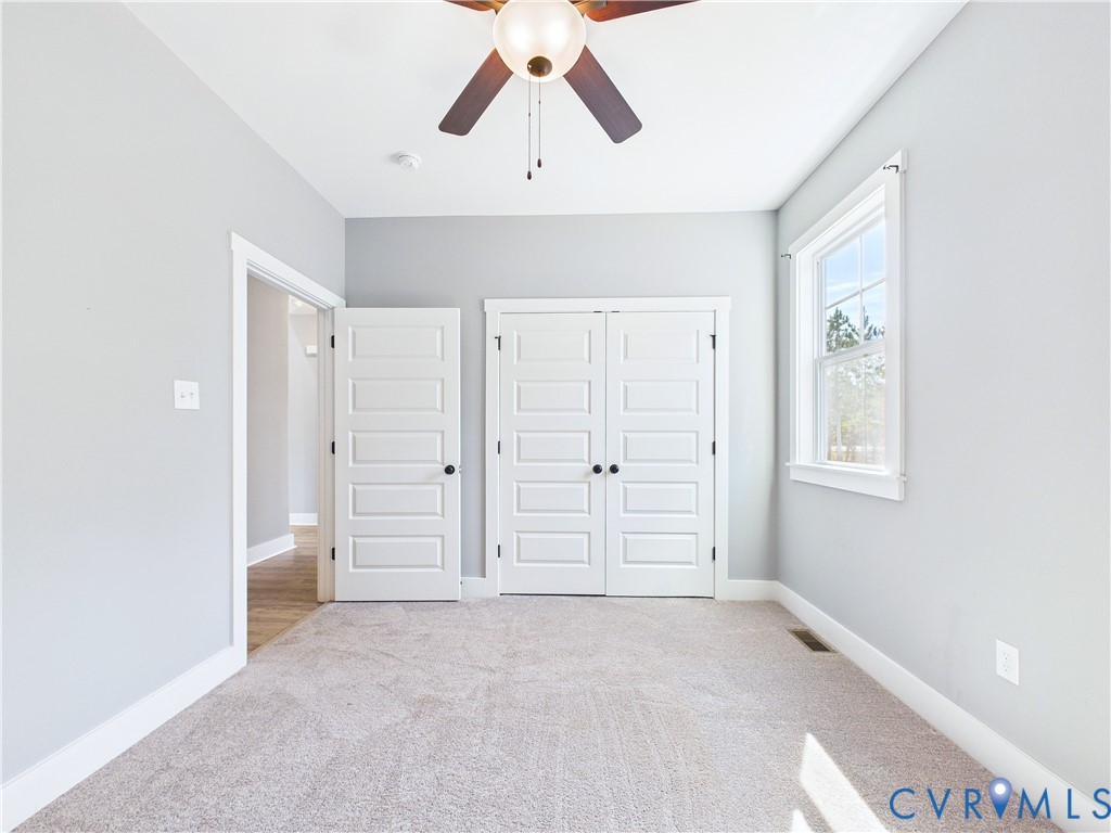 6795 Darlington Heights Road Cullen, VA 23934 - Photo 33 of 44 Unfurnished bedroom with light colored carpet, cei