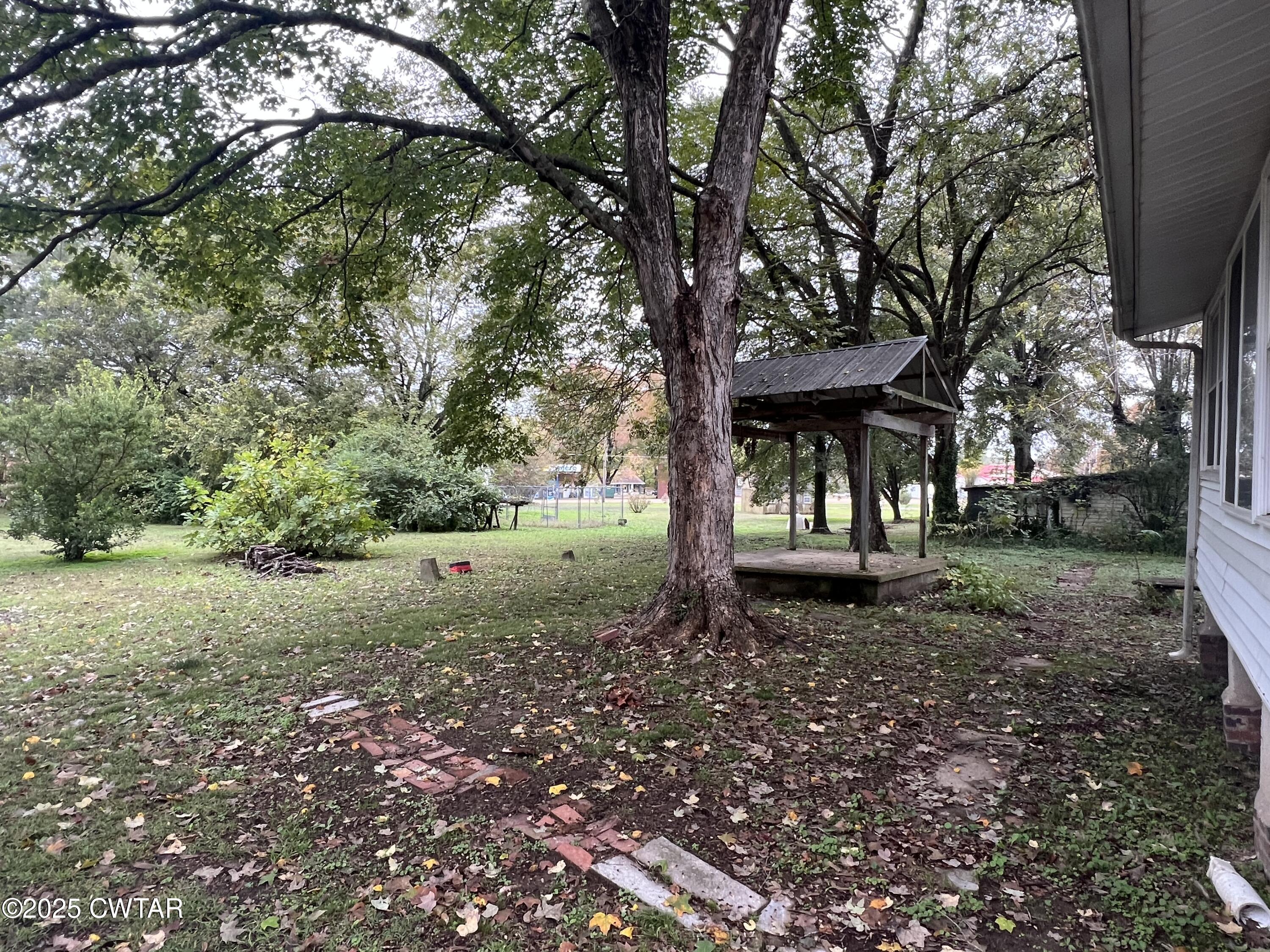 117 South Main Street Gibson, TN 38343 - Photo 14 of 40 a view of a house with a yard