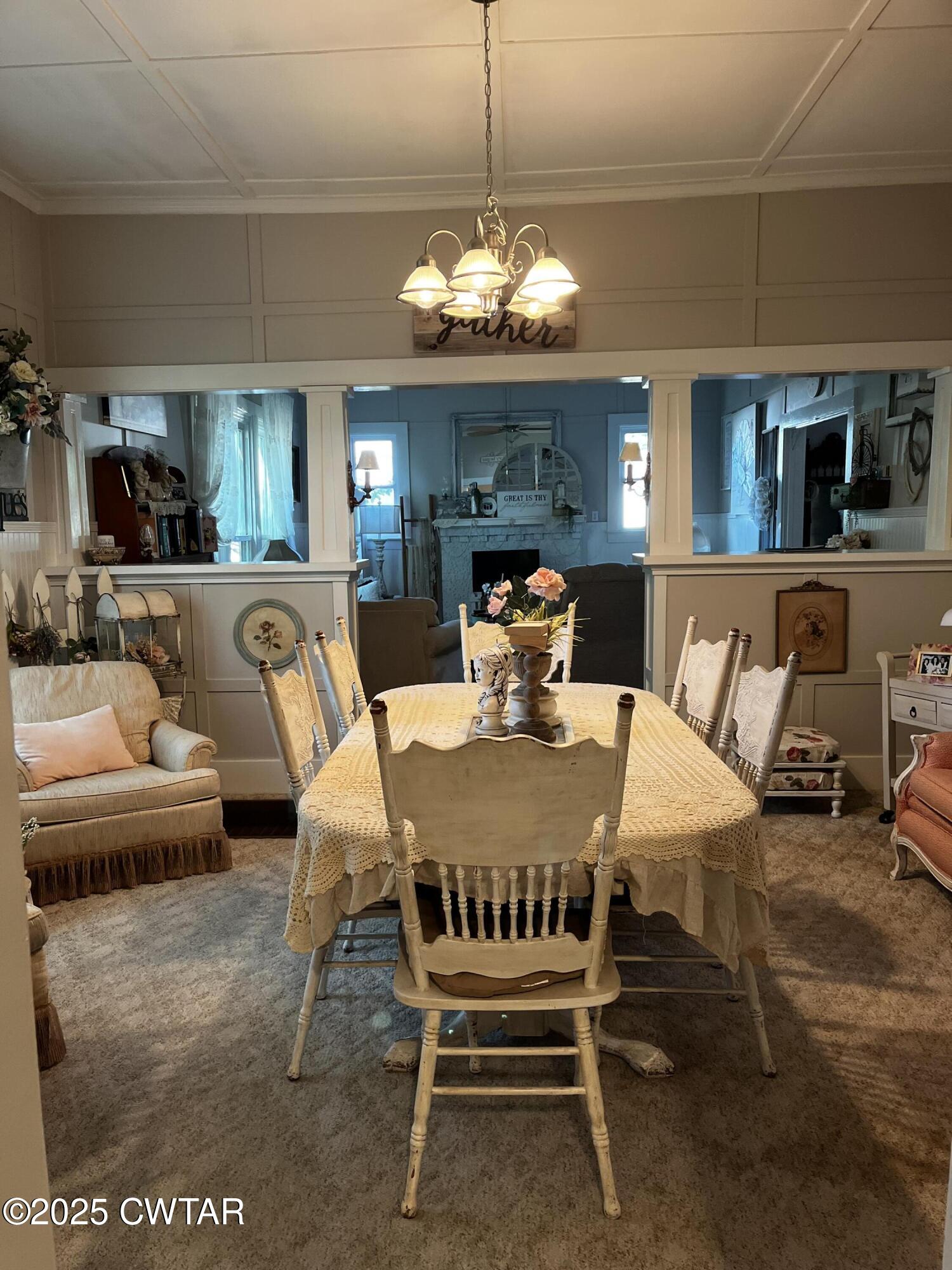 117 South Main Street Gibson, TN 38343 - Photo 28 of 40 a view of a dining room with furniture and chandelier