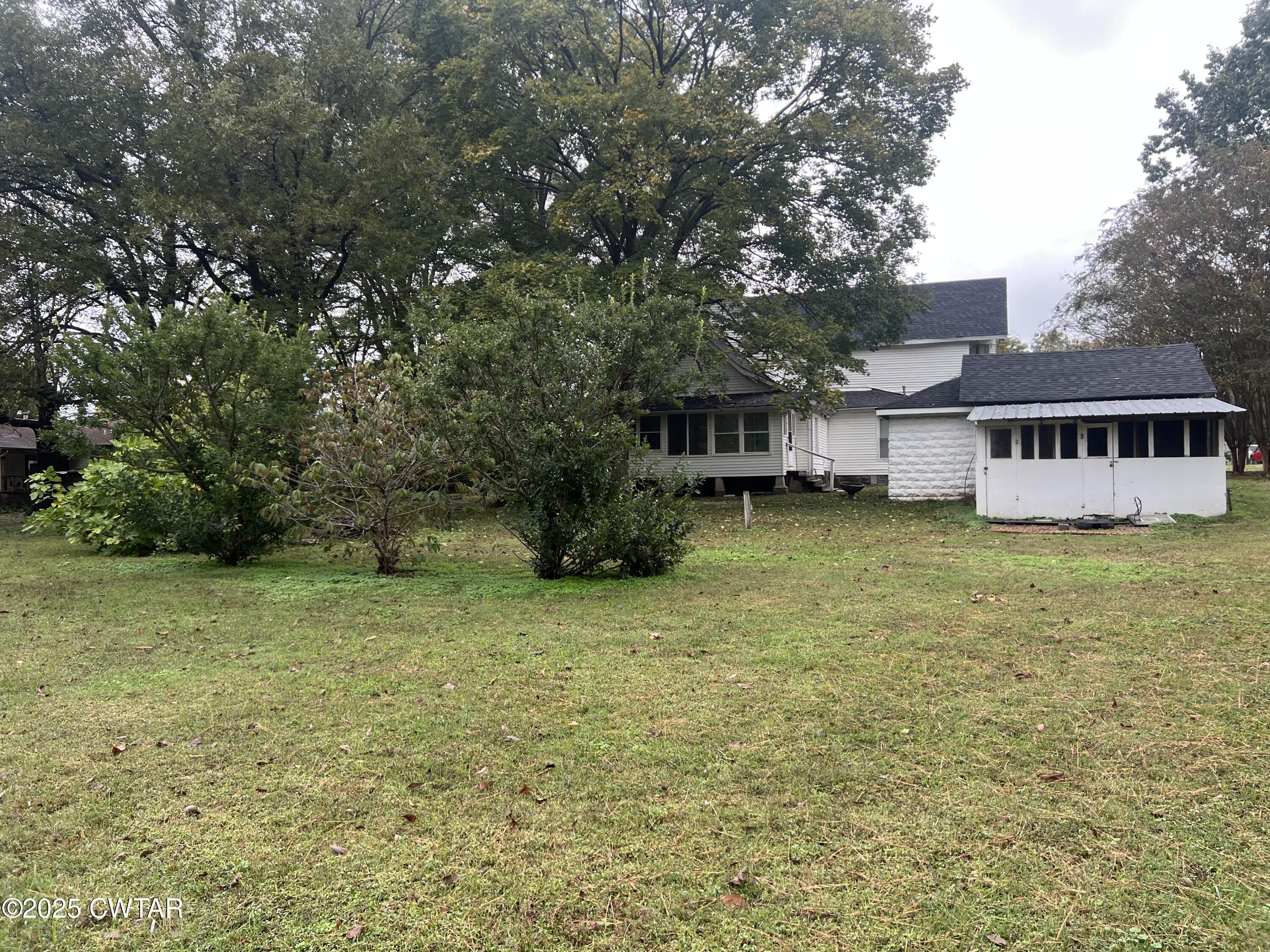 117 South Main Street Gibson, TN 38343 - Photo 8 of 40 a view of a house with a yard and tree