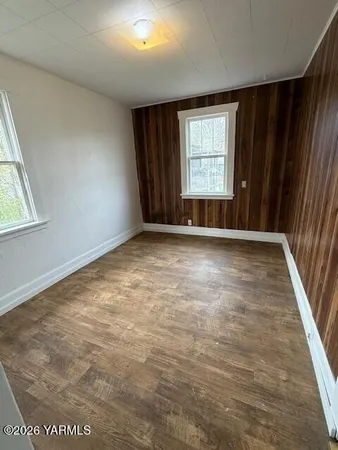 an empty room with windows