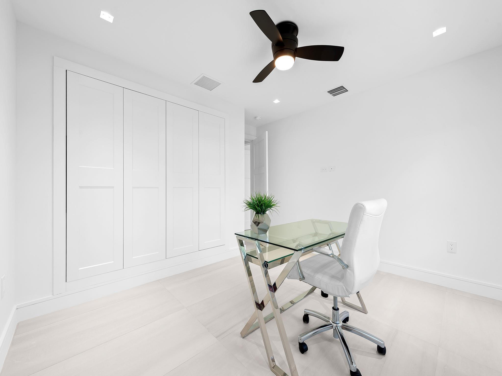 332 Northeast 29th Street Wilton Manors, FL 33334 - Photo 18 of 28 a view of a room with a table and chairs