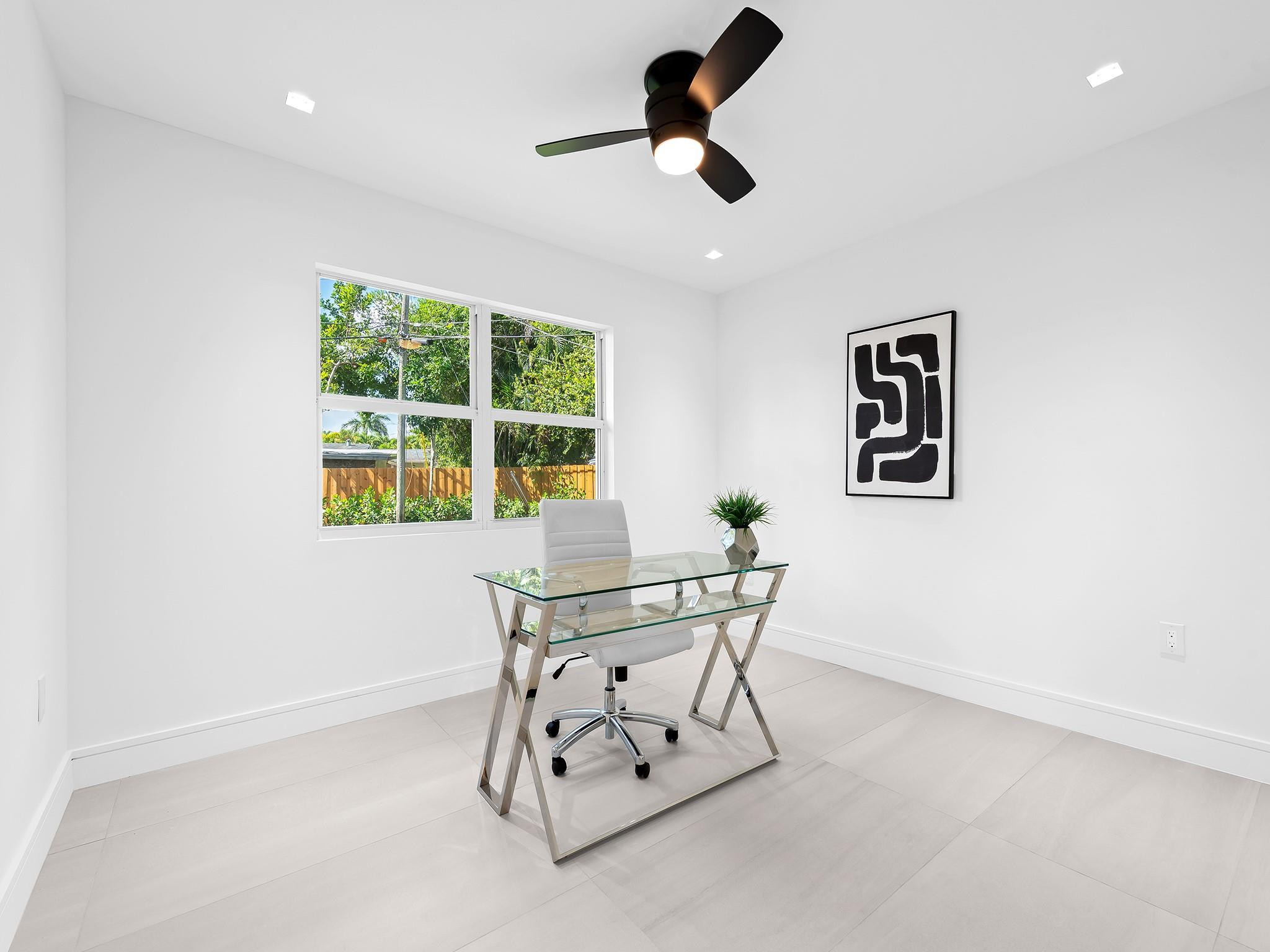 332 Northeast 29th Street Wilton Manors, FL 33334 - Photo 19 of 28 a dining room with furniture and window