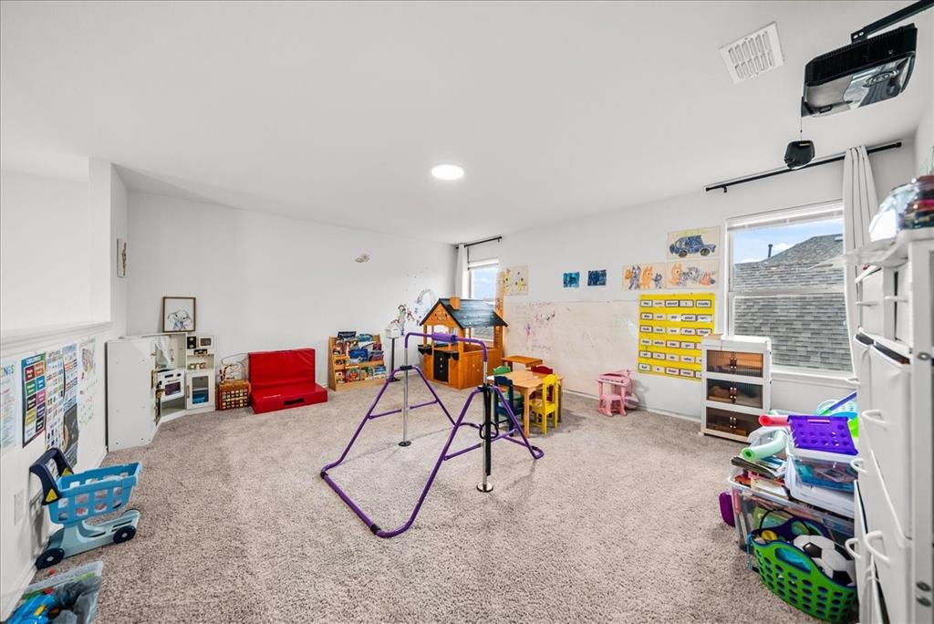 1908 Twisted Tree Lane Mesquite, TX 75149 - Photo 12 of 22 Rec room with carpet flooring