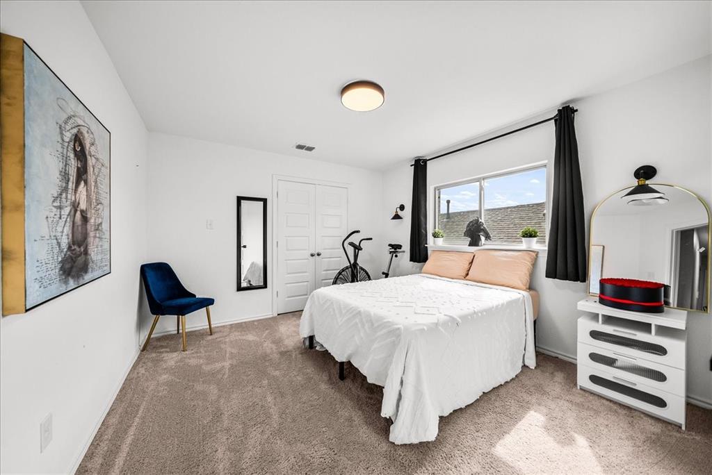 1908 Twisted Tree Lane Mesquite, TX 75149 - Photo 15 of 22 Carpeted bedroom featuring baseboards and a closet