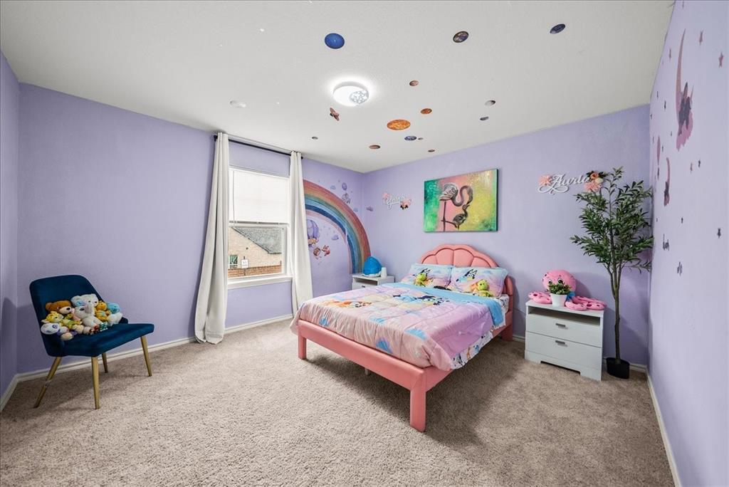 1908 Twisted Tree Lane Mesquite, TX 75149 - Photo 16 of 22 Bedroom featuring light carpet and baseboards