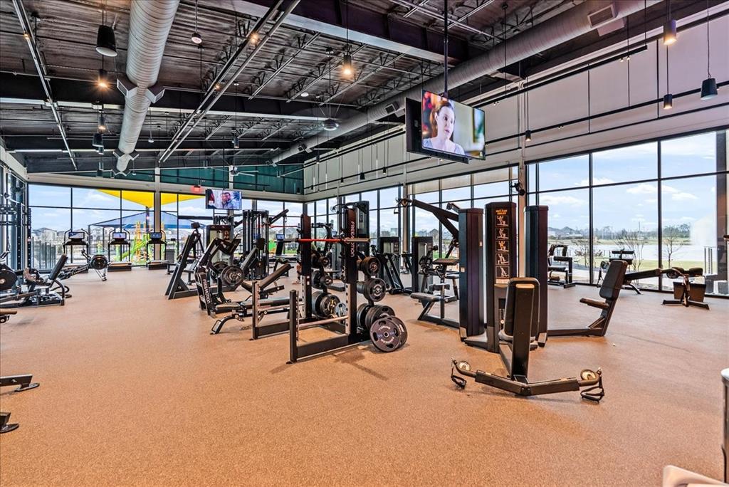1908 Twisted Tree Lane Mesquite, TX 75149 - Photo 21 of 22 Exercise room with expansive windows and a high ceiling