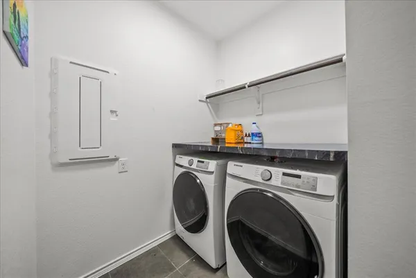 a utility room with dryer and washer