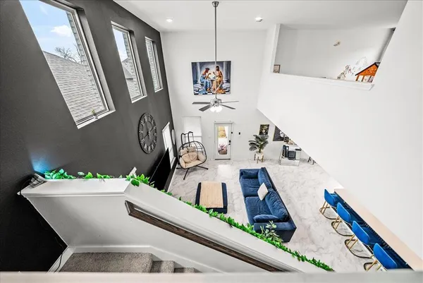 a view of living room with furniture and rug