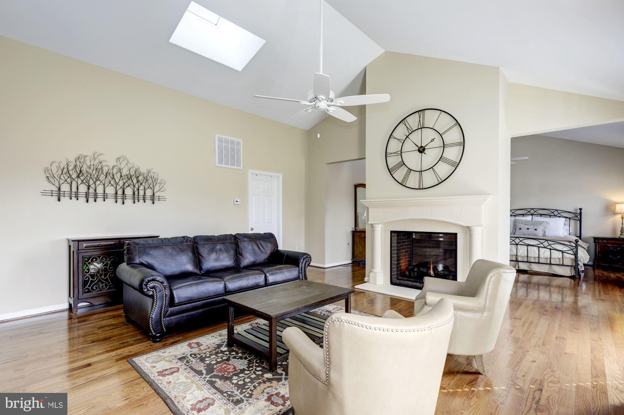 2005 Kingsforth Drive Fallston, MD 21047 - Photo 29 of 53 a living room with furniture a fireplace and wooden floor