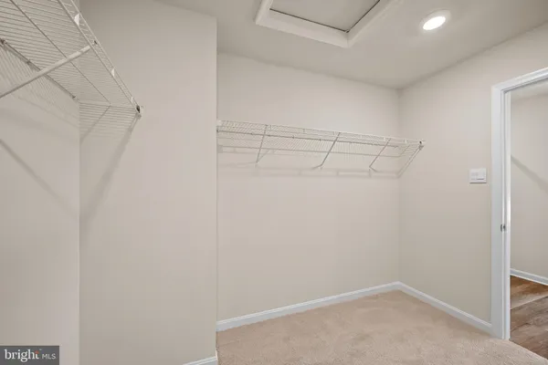 a view of a room with racks on the wall