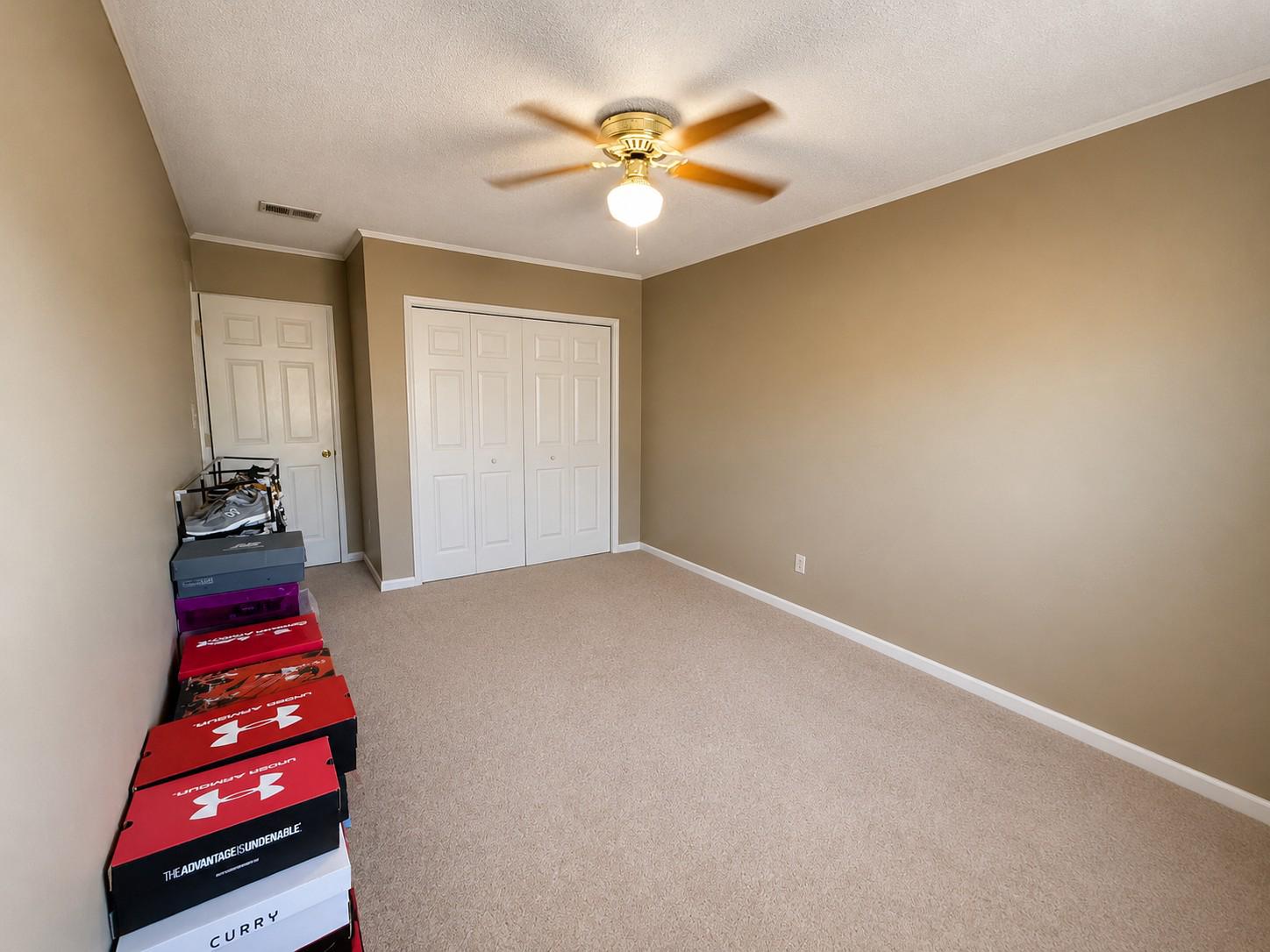 813 Thimbleberry Road, Unit 813 Baltimore, MD 21220 - Photo 19 of 32 Bedroom 2: Spacious room with warm inviting tones.