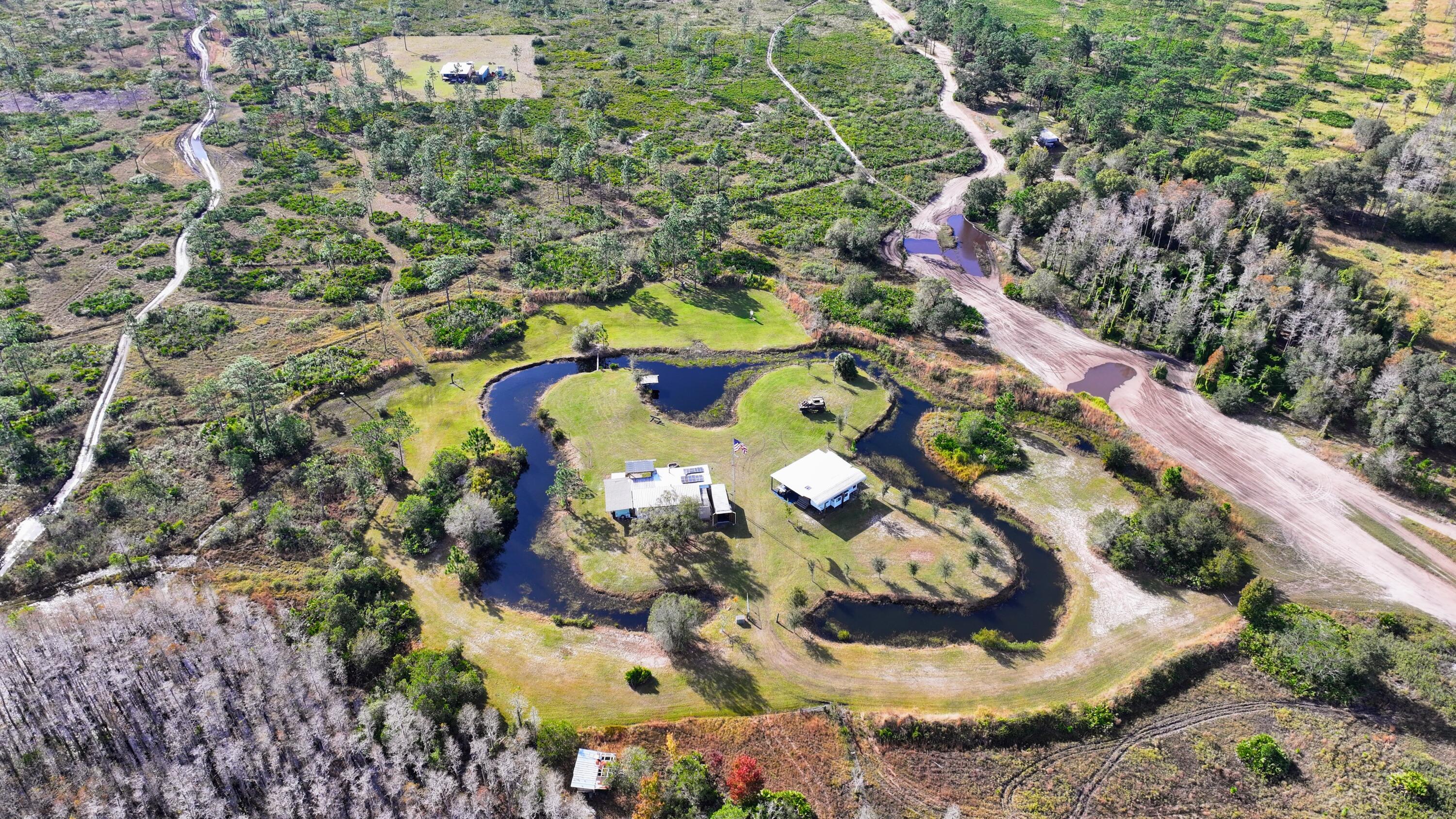 1224001 Holopaw Groves Rd Street St. Cloud, FL 34773 - Photo 3 of 99 dji_fly_20231207_095956_0094_17019767115