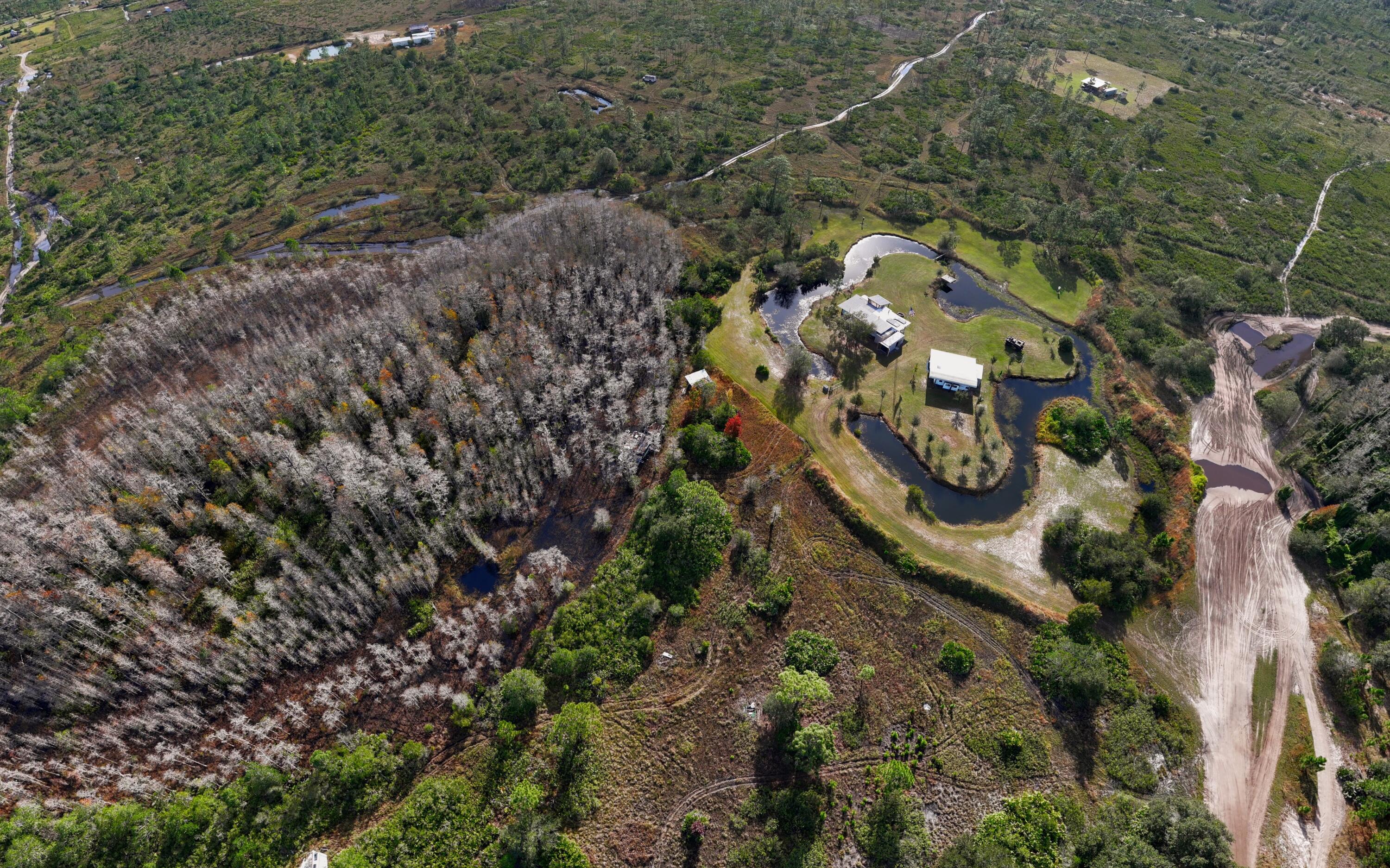 1224001 Holopaw Groves Rd Street St. Cloud, FL 34773 - Photo 80 of 99 dji_export_20231208_123325_1702056805242