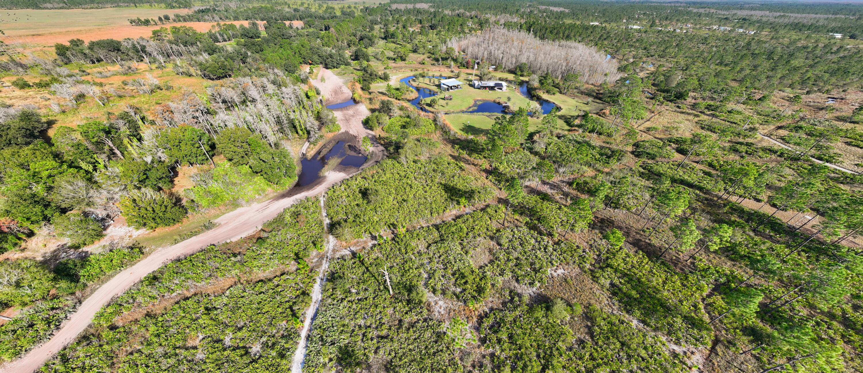 1224001 Holopaw Groves Rd Street St. Cloud, FL 34773 - Photo 83 of 99 dji_fly_20231207_095204_0089_17019767274
