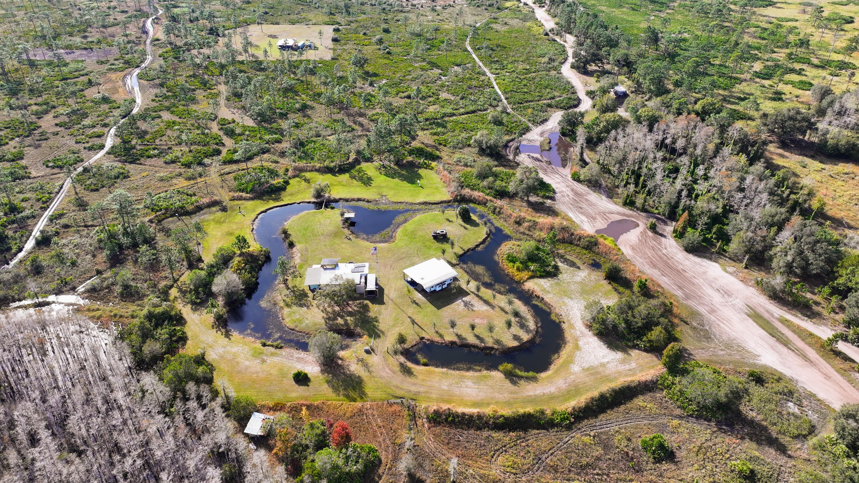 1224001 Holopaw Groves Rd Street St. Cloud, FL 34773 - Photo 85 of 99 dji_fly_20231207_100830_0101_17019766911