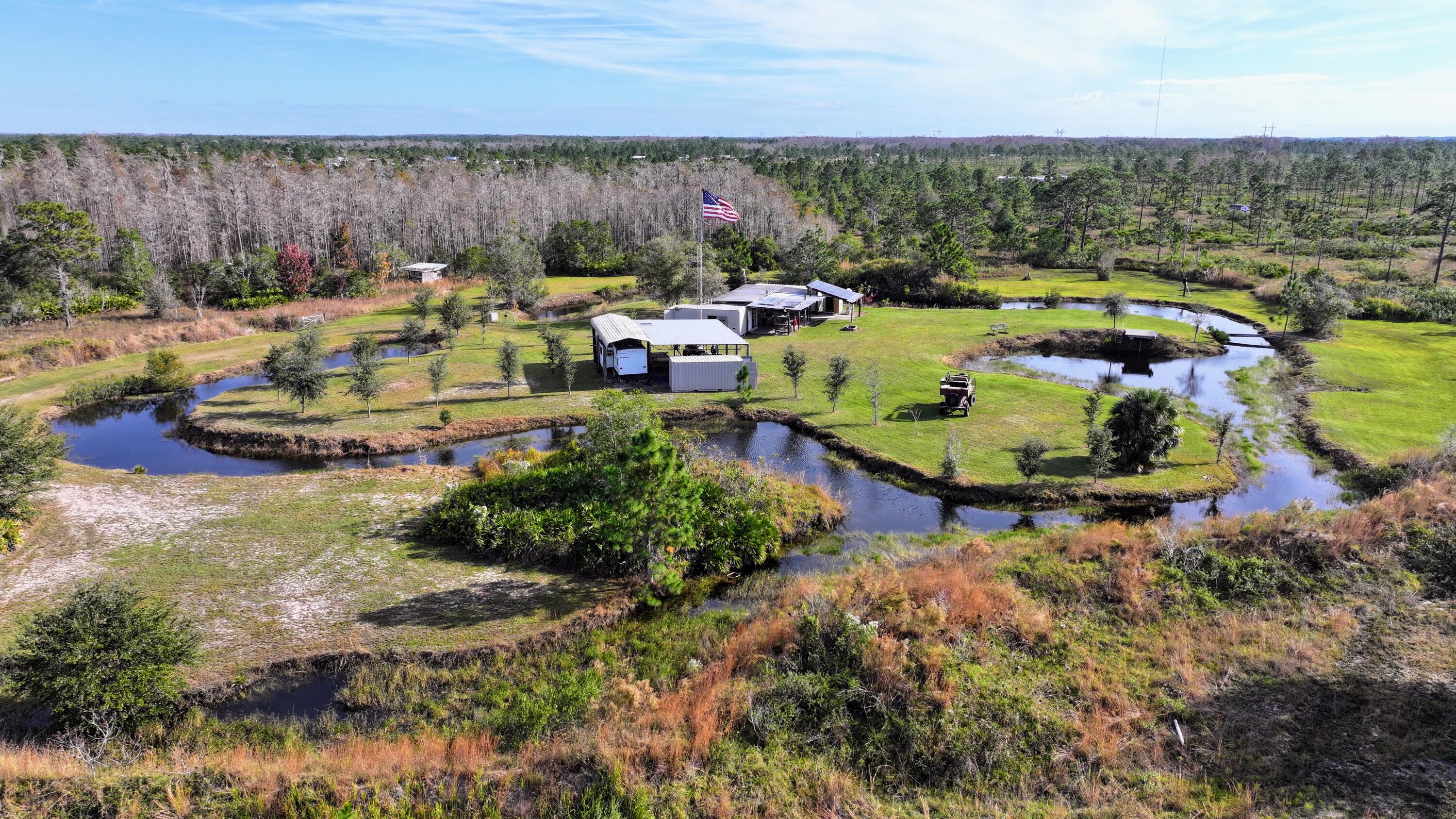 1224001 Holopaw Groves Rd Street St. Cloud, FL 34773 - Photo 87 of 99 dji_fly_20231207_101004_0104_17019766802