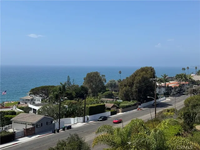 a view of a street with houses