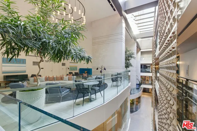 swimming pool view with outdoor seating