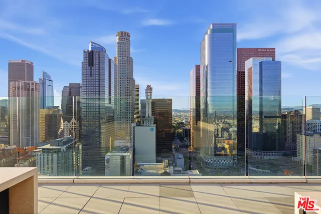 a view of a city with tall buildings