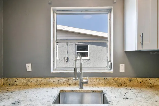 a bathroom with a shower and a toilet