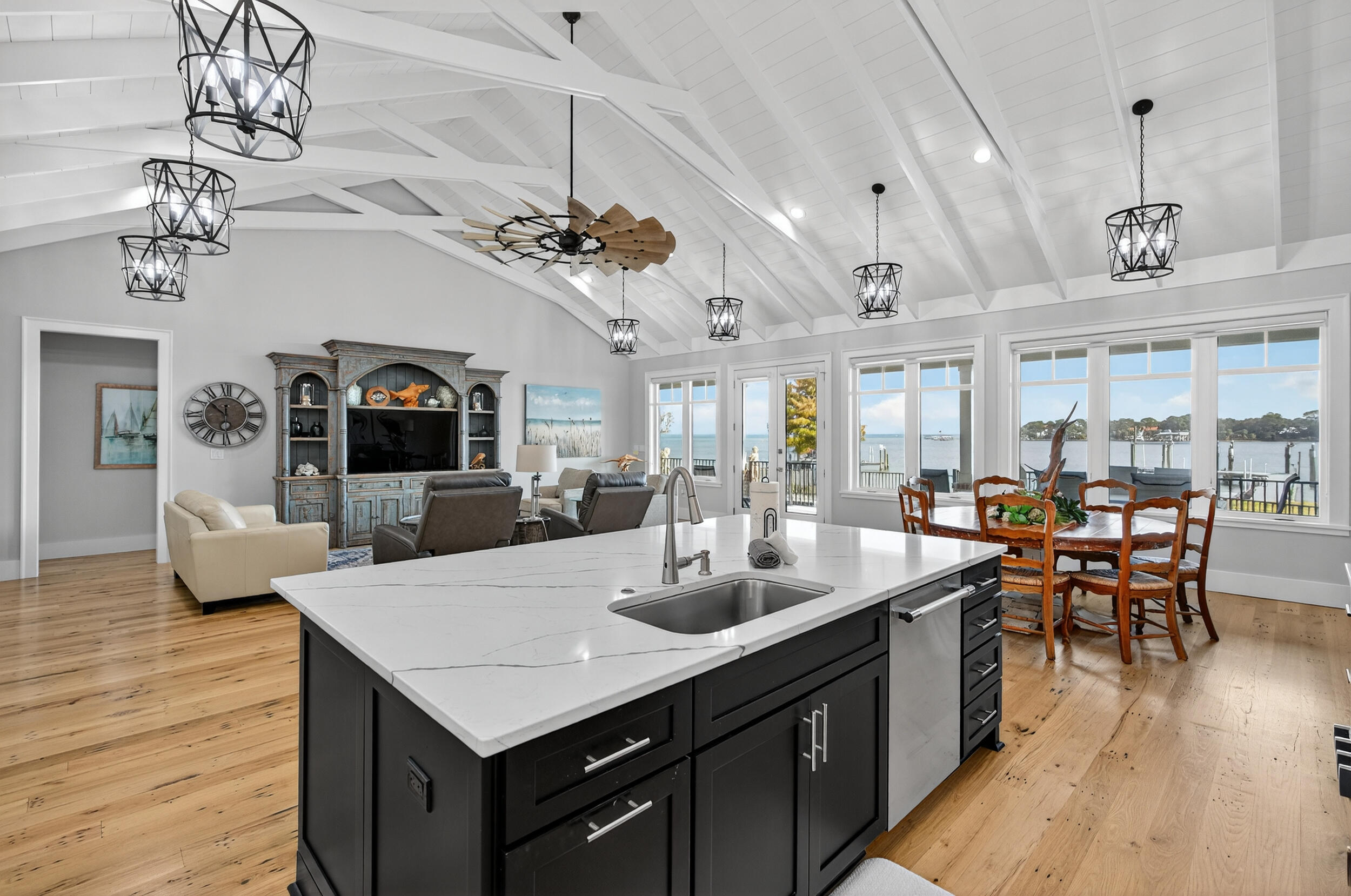 901 Peacock's Point Drive Destin, FL 32541 - Photo 14 of 64 a kitchen with a table chairs and wooden floor