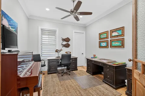 a en suite bathroom with a double vanity sink and a mirror