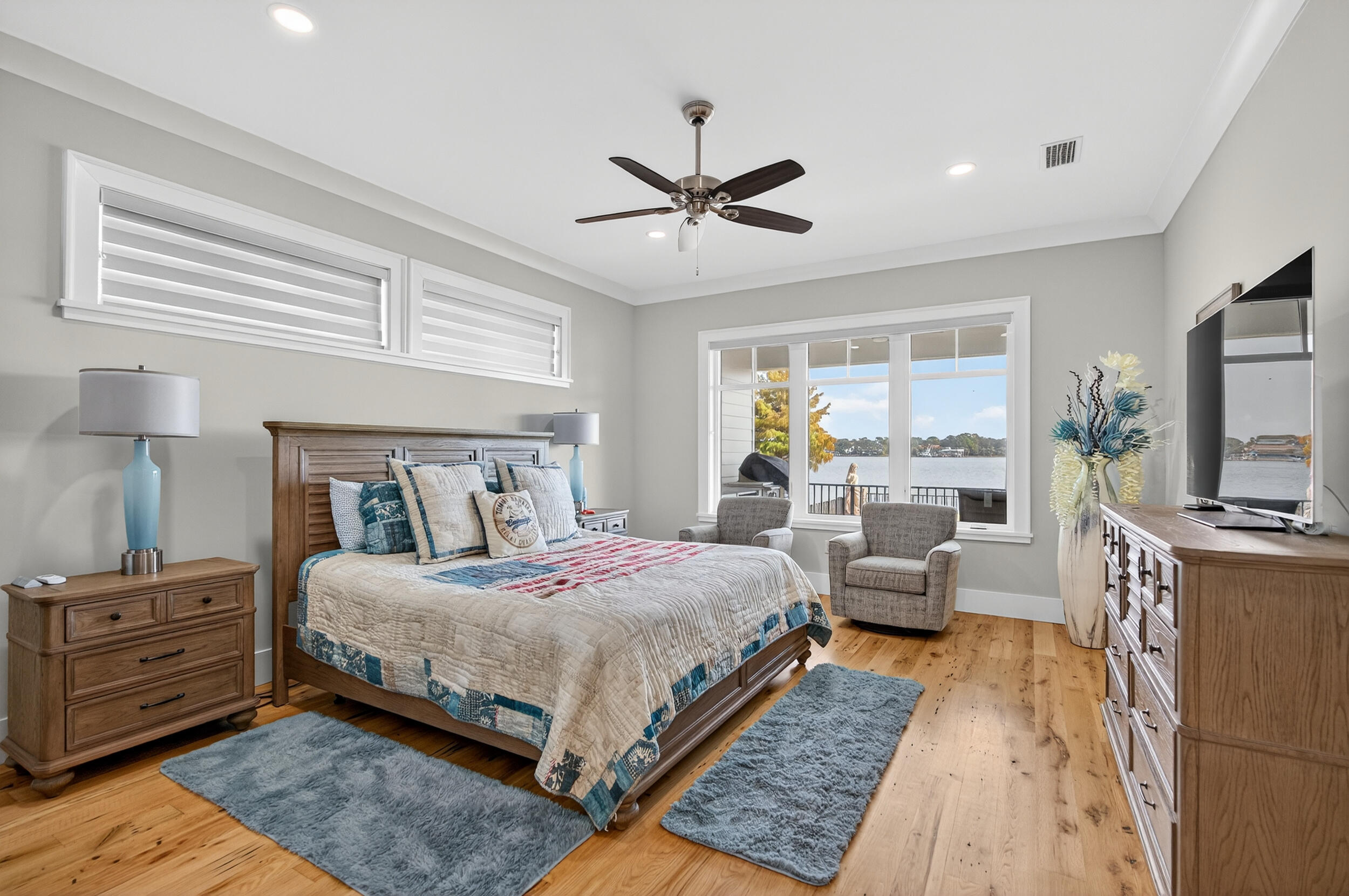 901 Peacock's Point Drive Destin, FL 32541 - Photo 24 of 64 a bedroom with a bed and wooden floor