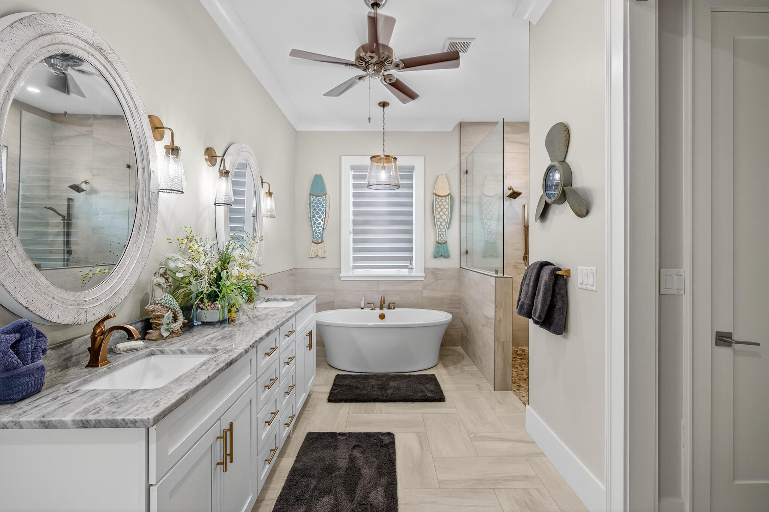 901 Peacock's Point Drive Destin, FL 32541 - Photo 27 of 64 a bathroom with a granite countertop sink a mirror and shower