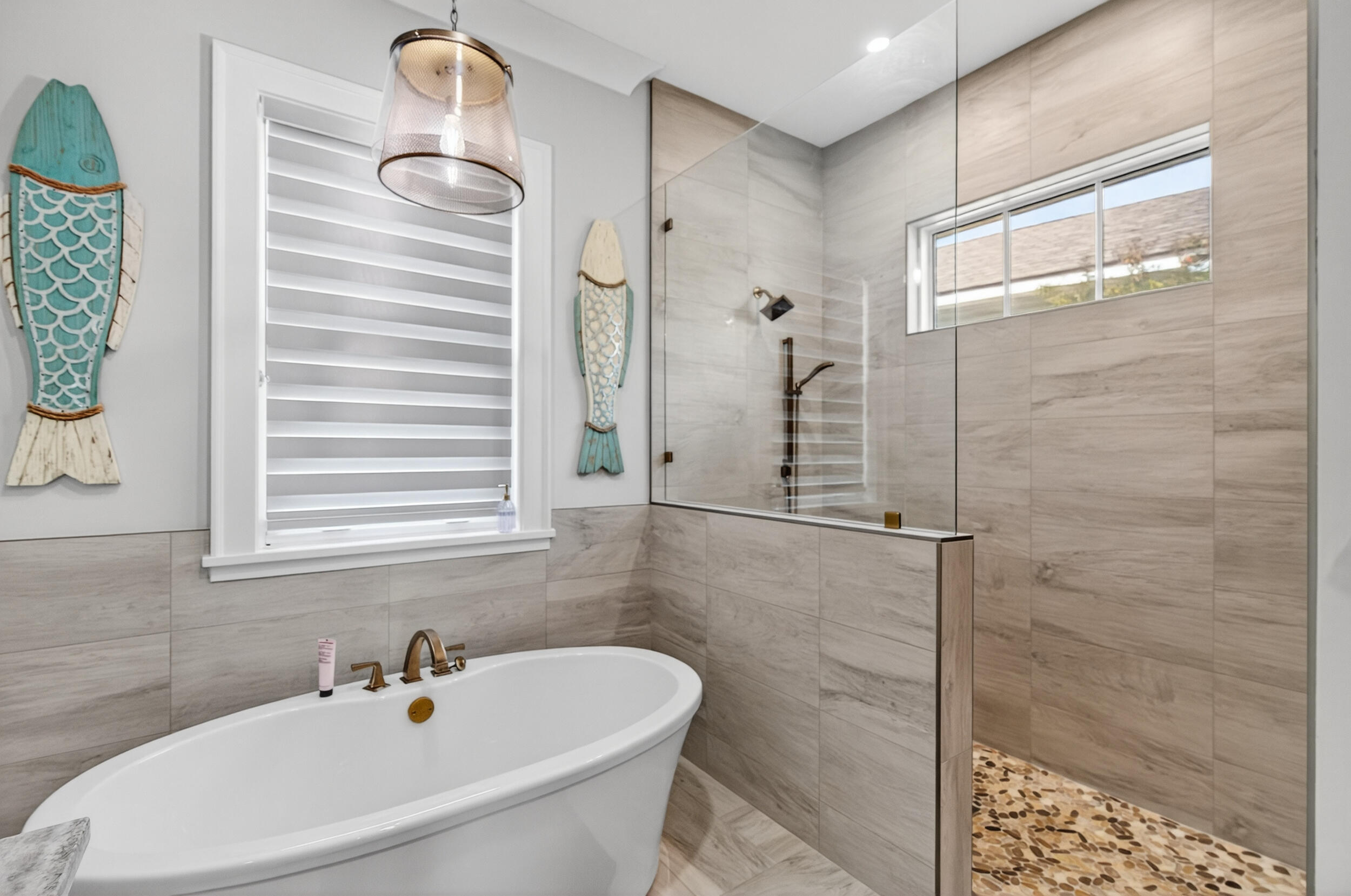 901 Peacock's Point Drive Destin, FL 32541 - Photo 28 of 64 a bathroom with a sink a window and shower