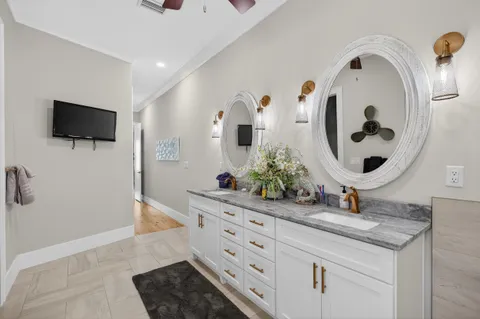a view of swimming pool with a lake and trees in the background