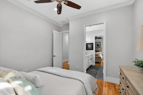 a view of a house with swimming pool and sitting area