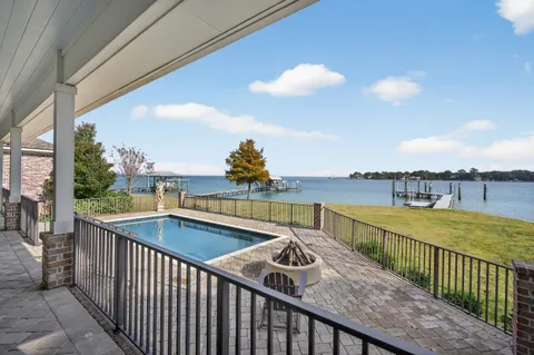 an aerial view of a swimming pool and outdoor space