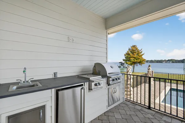 a bathroom with a toilet a sink and a mirror