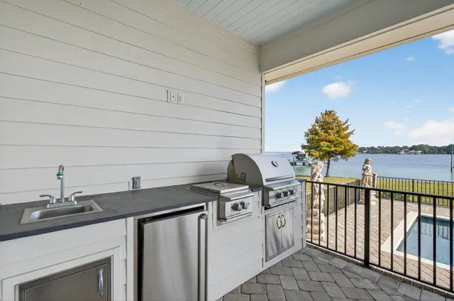 a bathroom with a toilet a sink and a mirror